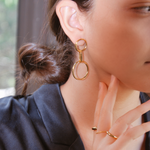 gold, earrings, hand, face, ring, bun, shirt